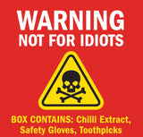 Warning - Not for Idiots. Box contains: Chilli Extract, Safety Gloves, Toothpicks