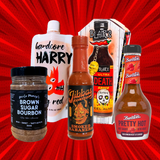 Collection of 5 hot sauces on a red background