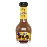 Bottle of Bunsters Gold Label Hot Sauce on a white background