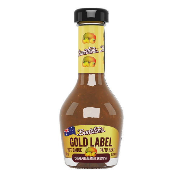 Bottle of Bunsters Gold Label Hot Sauce on a white background