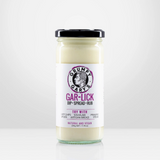 A 220g jar of Grumpy Gary's Gar-Lick Dip on a white background.