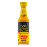 Bottle of Hot Ones Tropical Amarillo hot sauce on a white background