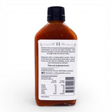 A 200ml bottle of Old Bones Chilli Co Jawbreaker Chilli Sauce on a white background, rear view.