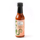 A 148ml bottle of Smokin' Dragon Smoked Habanero & Peach Hot Sauce on a white background.