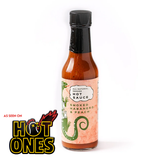 A 148ml bottle of Smokin' Dragon Smoked Habanero & Peach Hot Sauce, on a white background, with the As seen on Hot Ones logo in the bottom left corner.
