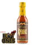 Front view of a 148ml bottle of Hot ones sauce "The Last Dab: Xperience" on a white background.