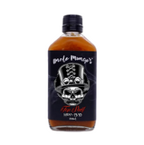 Bottle of Uncle Mungo's Top Shelf Hot Sauce with a skull design on a white background