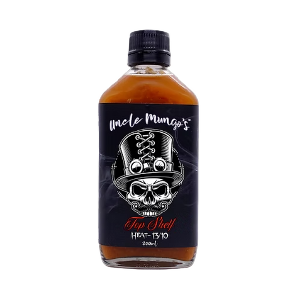 Bottle of Uncle Mungo's Top Shelf Hot Sauce with a skull design on a white background