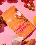 30g sachet of Aunty Jenny Butter Chicken Blend on atable surrounded by vegetables. Available to buy online in Australia at Blonde Chilli.
