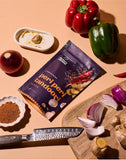 Sachet of Aunty Jenny Peri Peri Tandoori Blend amongst fresh vegetables. Available to buy online in Australia at Blonde Chilli.