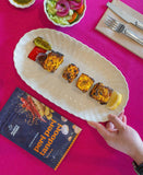 Sachet of Aunty Jenny Peri Peri Tandoori Blend beside a plate of Tandoori tofu. Available to buy online in Australia at Blonde Chilli.