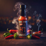 A bottle of Jibba's 50 Shades of Jalapeno hot sauce surrounded by smoking red and green jalapenos -buy online Australia | Blonde Chilli.
