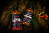 Pepper By Pinard Caribbean Hot Sauces on a tree trunk.