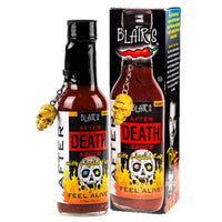 Blair's After Death Sauce - Bottle stands beside it's box packaging.