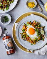 Culley's Roasted Carolina Reaper Hot Sauce shown with a fried egg meal.