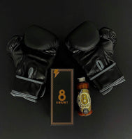 Culley's 8 Count Hot Sauce with Gift Box lies between boxing gloves