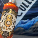 Culley's Limited Edition 8 Count Hot Sauce infront of painted Culley's mural