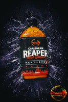 Pepper By Pinard Caribbean Reaper Hot Sauce 200ml bottle in a splash of water.