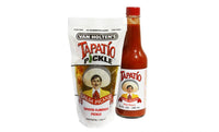Van Holten's Tapatio Flavoured pickle in a pouch standing alongside Tapatio Hot Sauce bottle